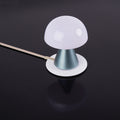 Lexon Mina Medium Lichtblauw│art. LH64MLB│Oplaadbare LED-Lamp│bovenaanzicht op draadloze oplader