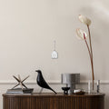 boven dressoir met Eames Bird