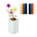 twee delen samen als wit blok met bloemen en losse delen klein afgebeeld  reechtsboven.