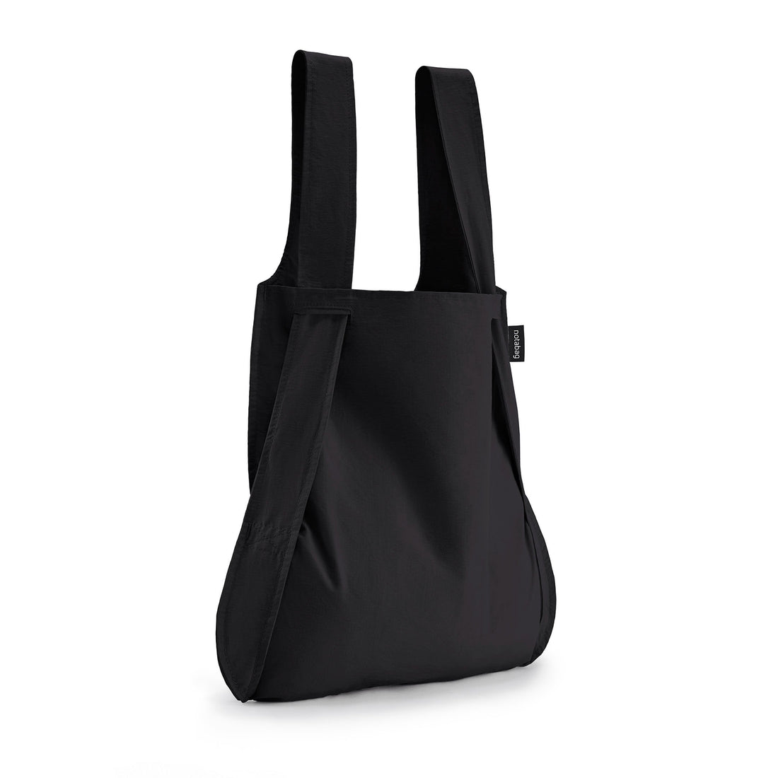 Schwarze Notabag als Shopper-Tasche vor weißem Hintergrund