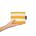 Notabag Golden Stripes opgevouwen in de hand