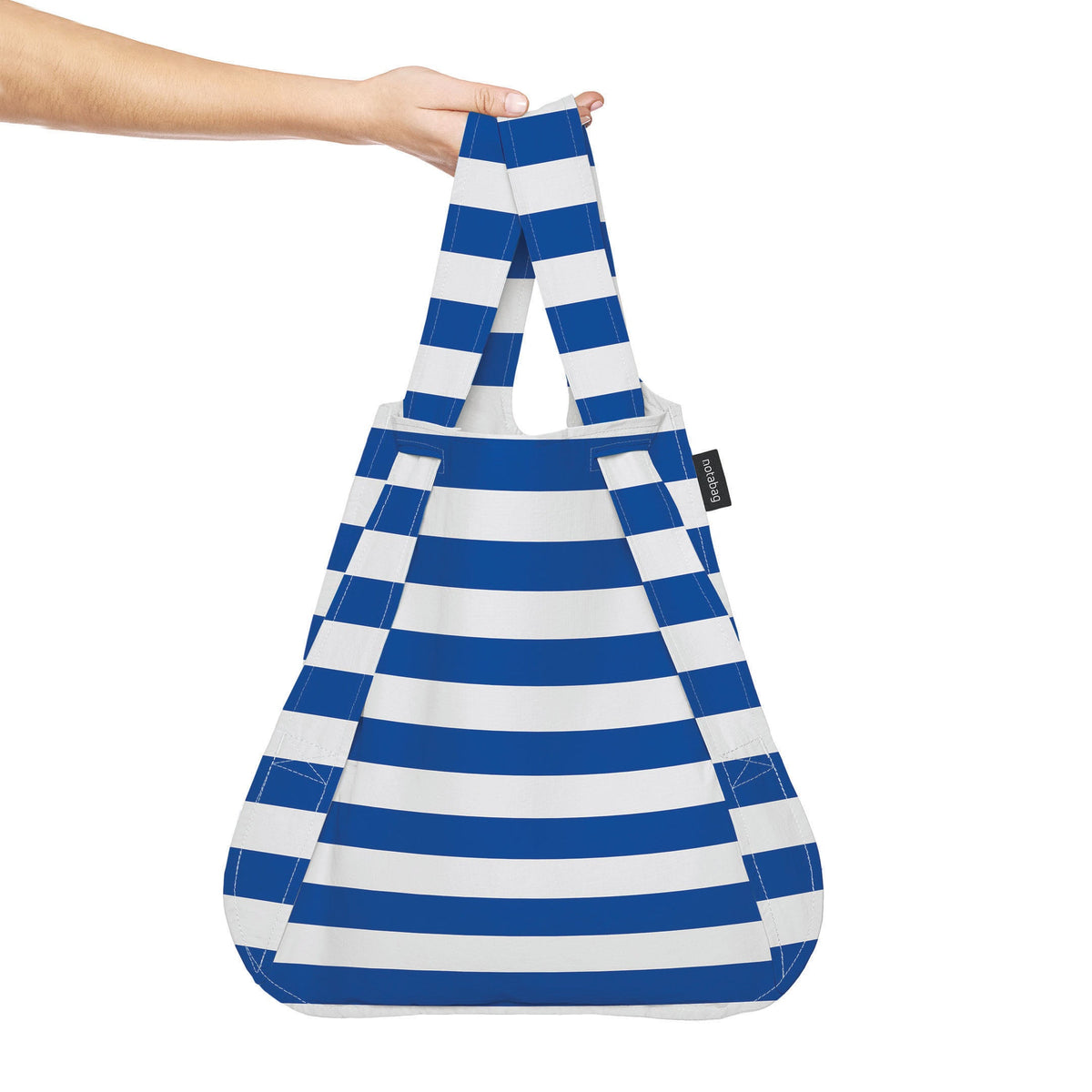 Notabag Marine Stripes shopper vastgehouden in de hand