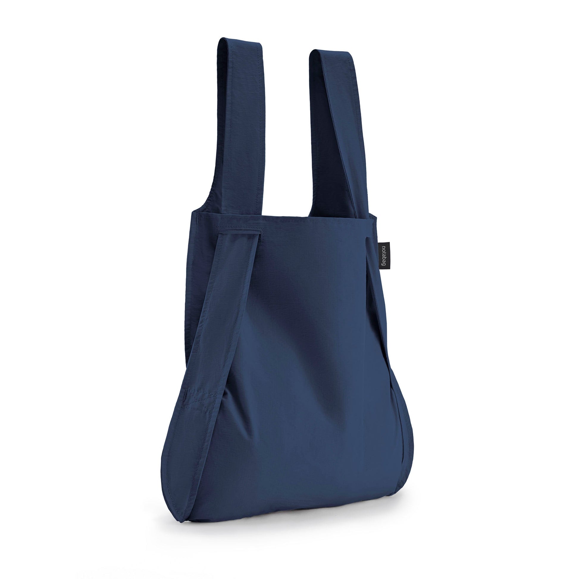 Navy Blue Notabag as a shopper bag against a white background