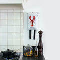 Blusdeken Kreeft Naais│Fire Blanket│art. FB01LOB│in keuken naast pan en pepermolen