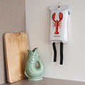 Blusdeken Kreeft Naais│Fire Blanket│art. FB01LOB│aan wand naast Gluckigluck vis waterkaraf
