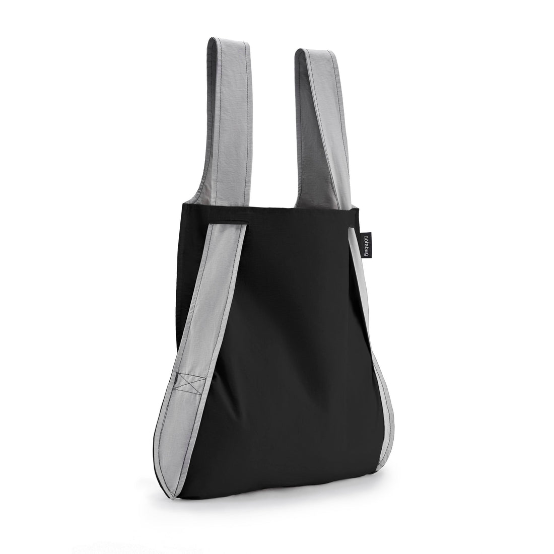 Notabag Grau & Schwarz als Shopper-Tasche vor weißem Hintergrund