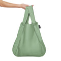 Notabag Olive shopper vastgehouden in de hand