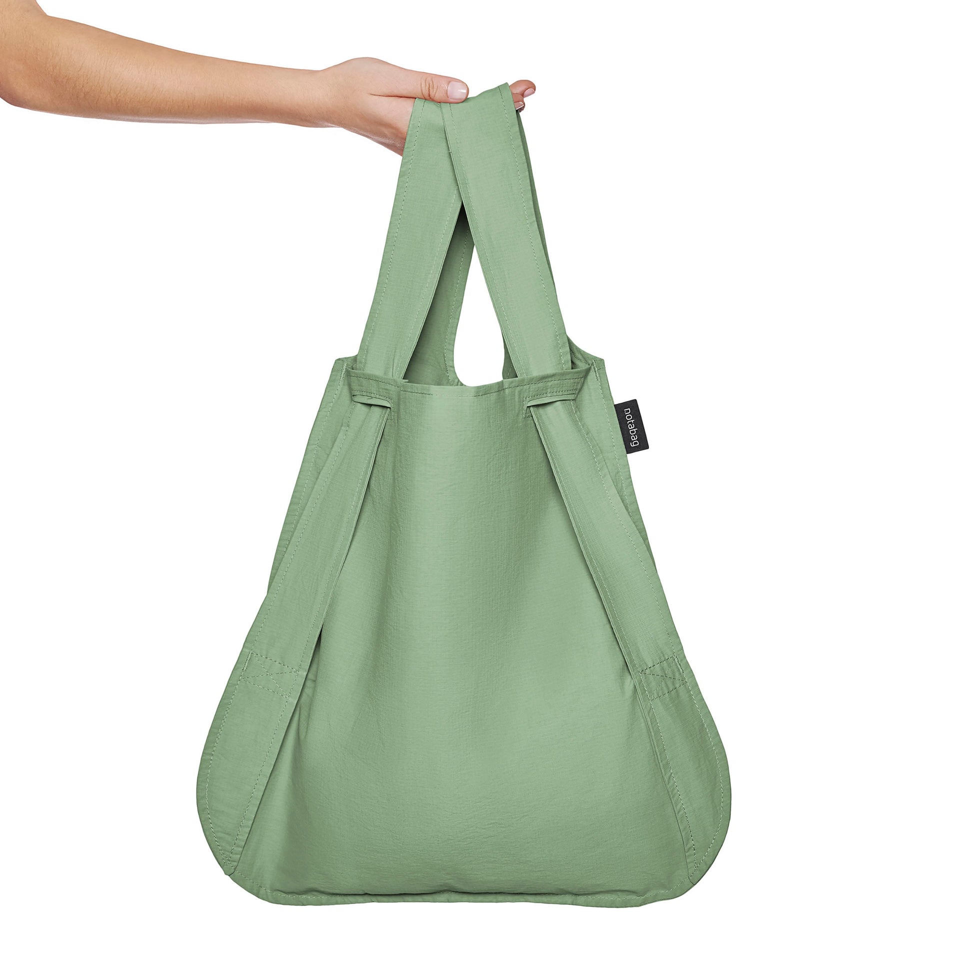 Notabag Olive shopper vastgehouden in de hand