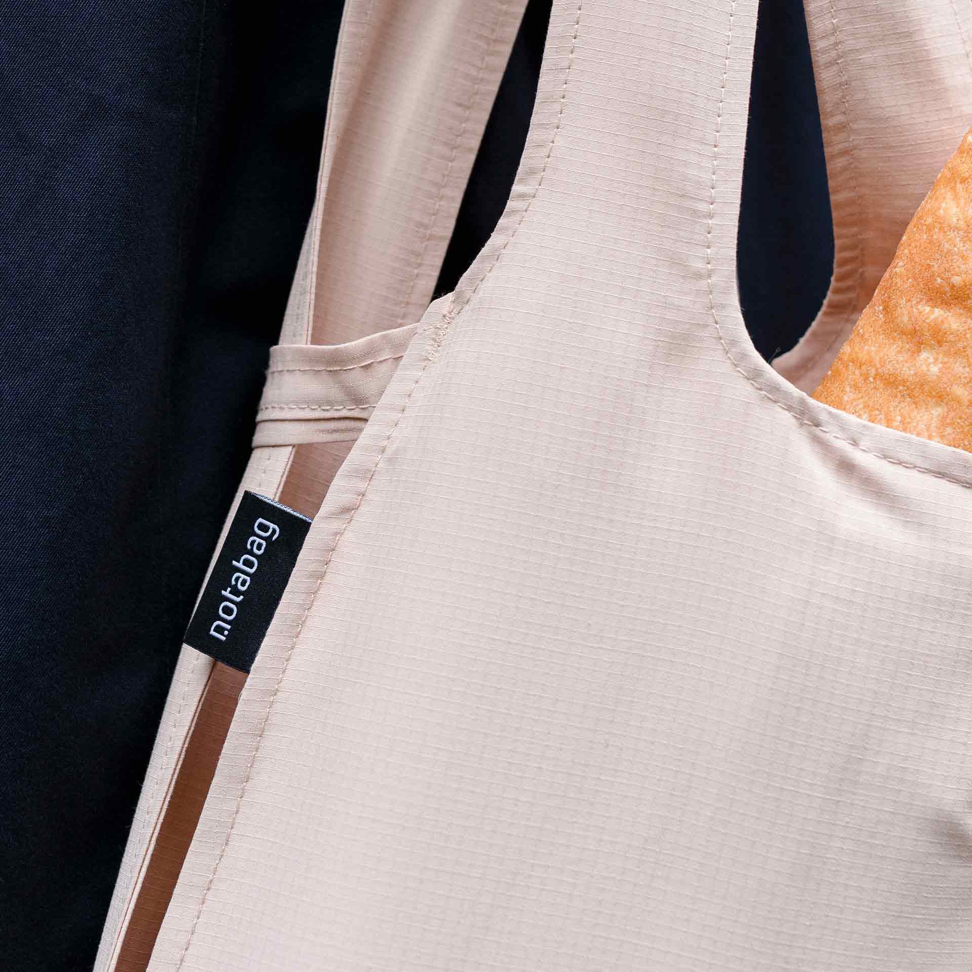 Detail des Etiketts von Notabag Sand