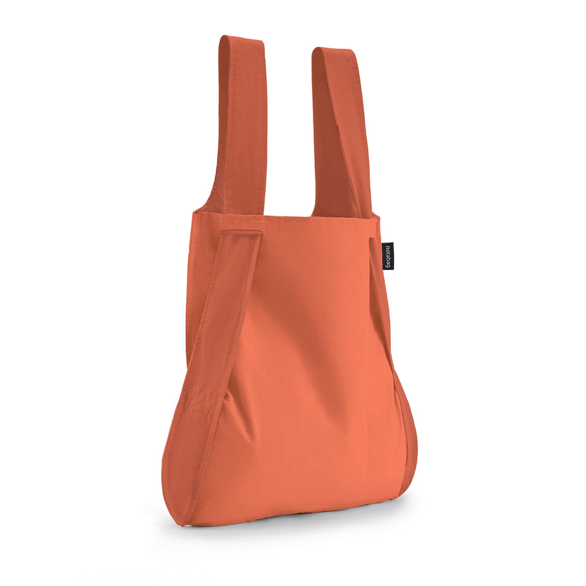Notabag Terracotta as a shopper bag against a white background