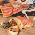 Notabag Vanilla Stripes shopper bag with a pineapple next to a beach chair