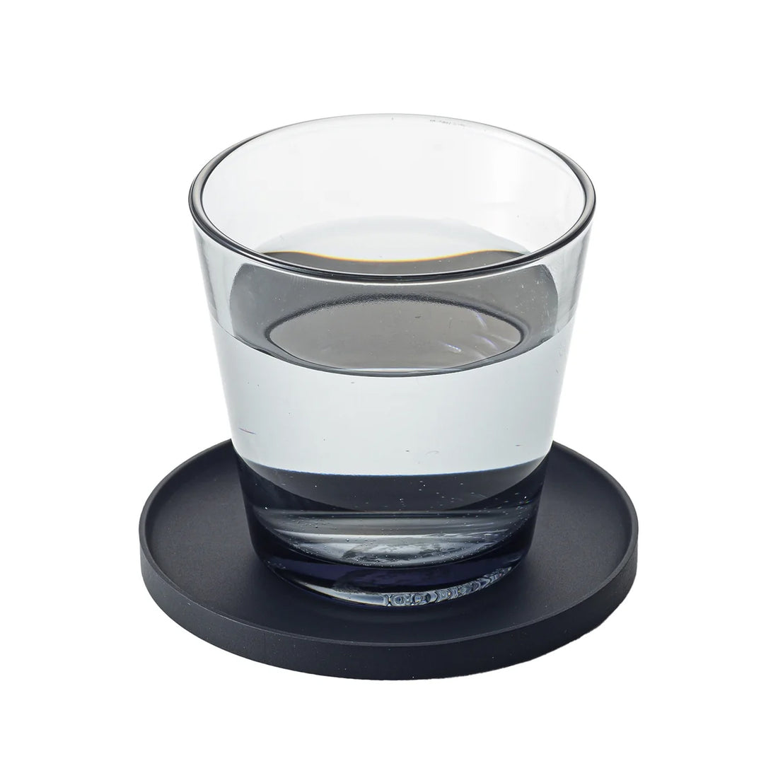 Tower onderzetter Siliconen Zwart│Yamazaki│art. 025393│met waterglas en witte achtergrond