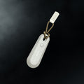 Orbitkey  Chipolo Tracker V2 Stone│art. TBT2-GRY-104│zwevend met zwarte achtergrond