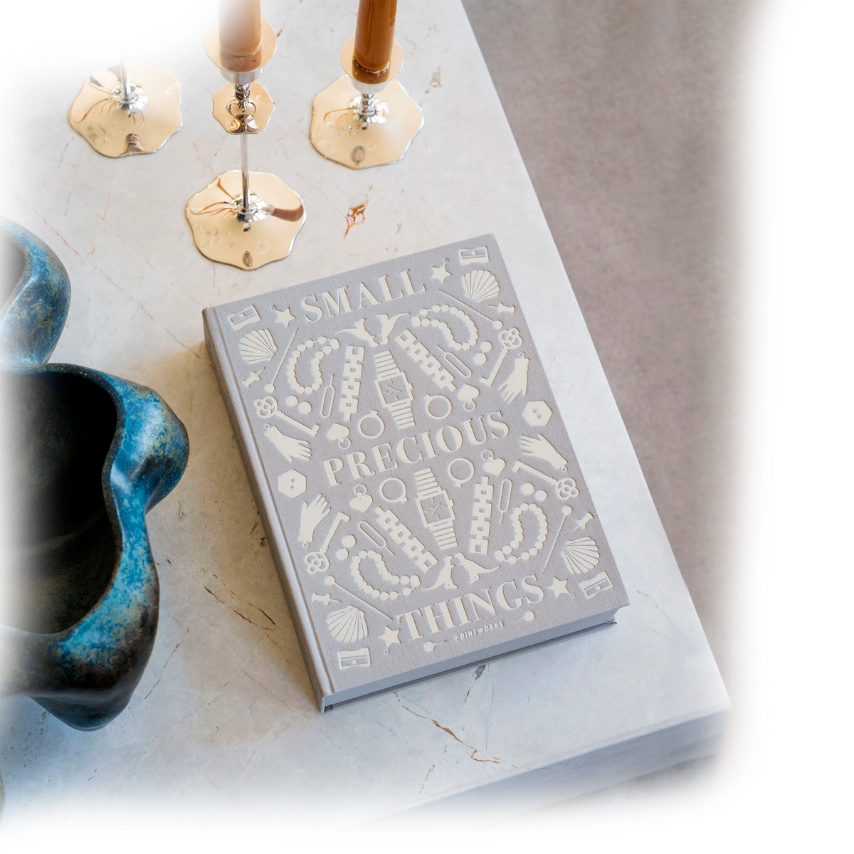 Grey Precious Things jewellery box by Printworks seen from above on a marble table