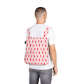 Man wears Notabag Red Brush as a backpack