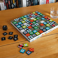 Remember Sudoku Wooden Board Game | loose tiles on the table beside the board