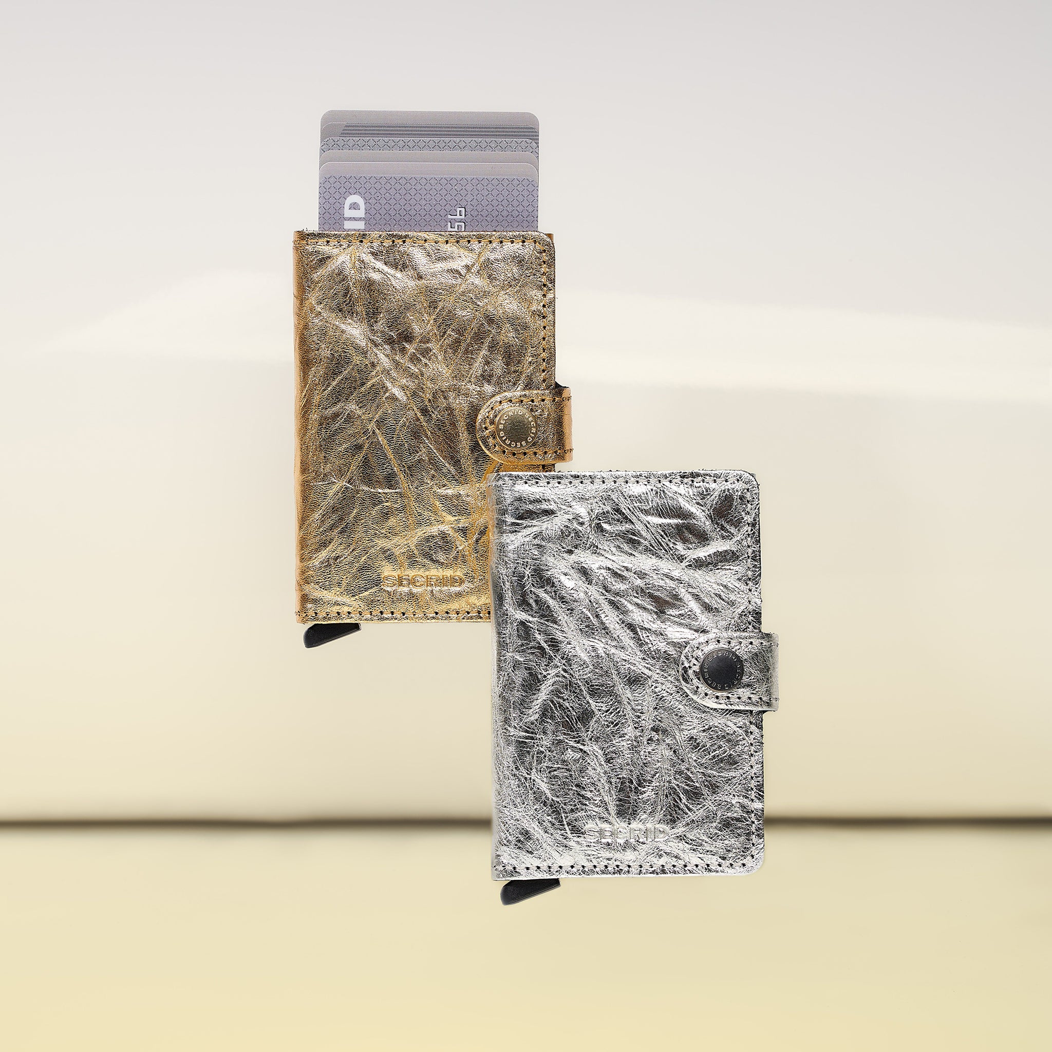 Secrid Miniwallet Crunch│art. MCR-SILVER│zwevend met Gold versie