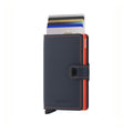 Secrid Miniwallet Matte│Pasjeshouder en Portemonnee│art. MM-NIGHTBLUE&ORANGE│vooraanzicht met uitgeschoven pasjes