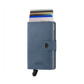 Secrid Miniwallet Original│art. M-ICE BLUE│Pasjeshouder│voorkant met uitgeschoven pasjes en clip