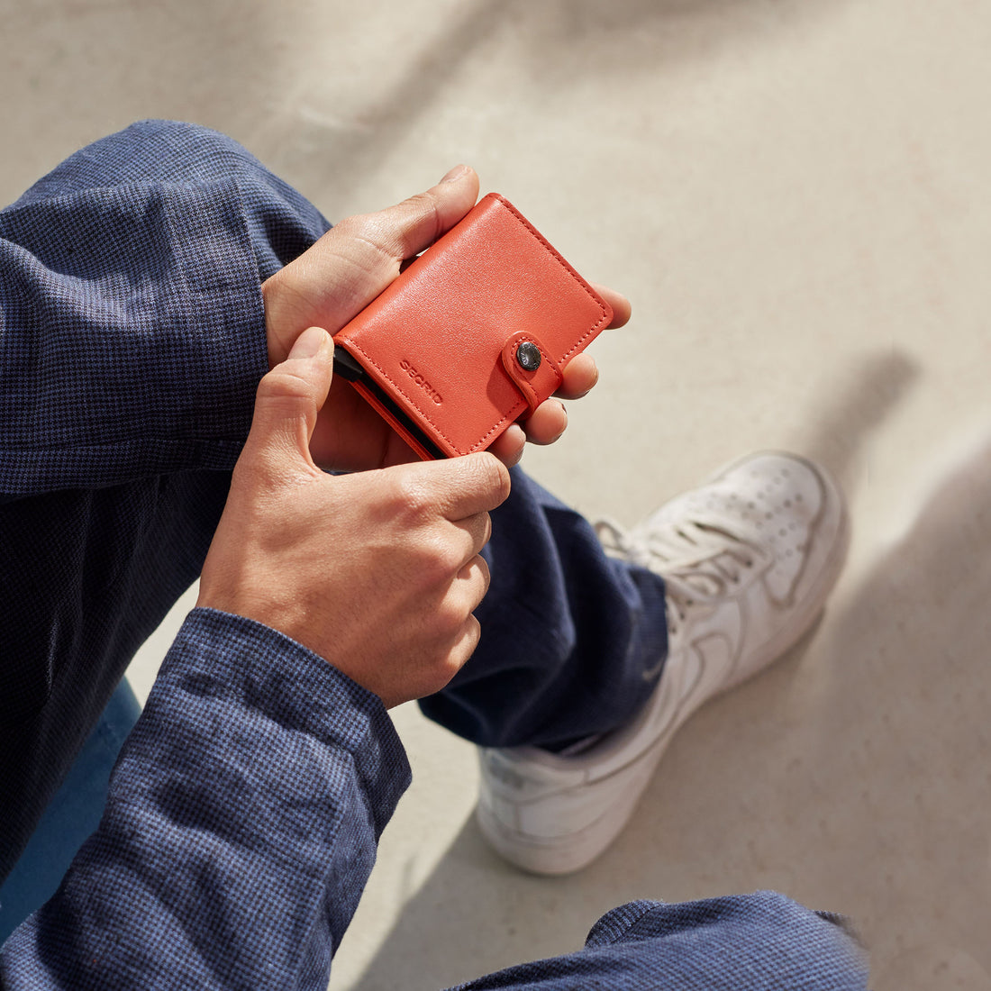 Secrid Miniwallet Original│Pasjeshouder en Portemonnee│art. M-ORANGE│vooraanzicht met witte achtergrond