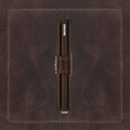 Secrid Miniwallet Vintage│art. MV-CHOCOLAT│Pasjeshouder│zikant met leersoort op achtergrond