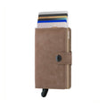 Secrid Miniwallet Vintage│art. MV-TAUPE│Pasjeshouder en Portemonnee│voorkant met uitgeschoven pasjes en clip