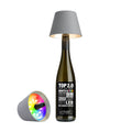 Sompex Top 2.0 Oplaadbare Flessenlamp│Grijs│Buitenverlichting│art. 72533│op fles en liggend naast fles met RGB kleuren aan
