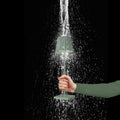 Sompex Troll 2.0 Olijfgroen│Oplaadbare Tafellamp│Buitenverlichting│art. 78174│in hand onder spatwater