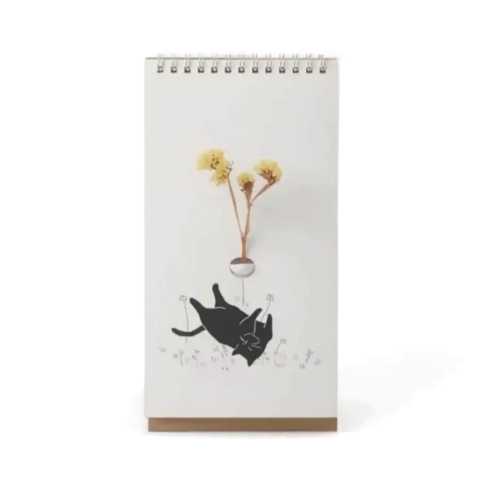 Flip Vase Kat Spextrum - vooraanzicht met een tekening van een zwarte kat die op zijn rug rolt in het gras