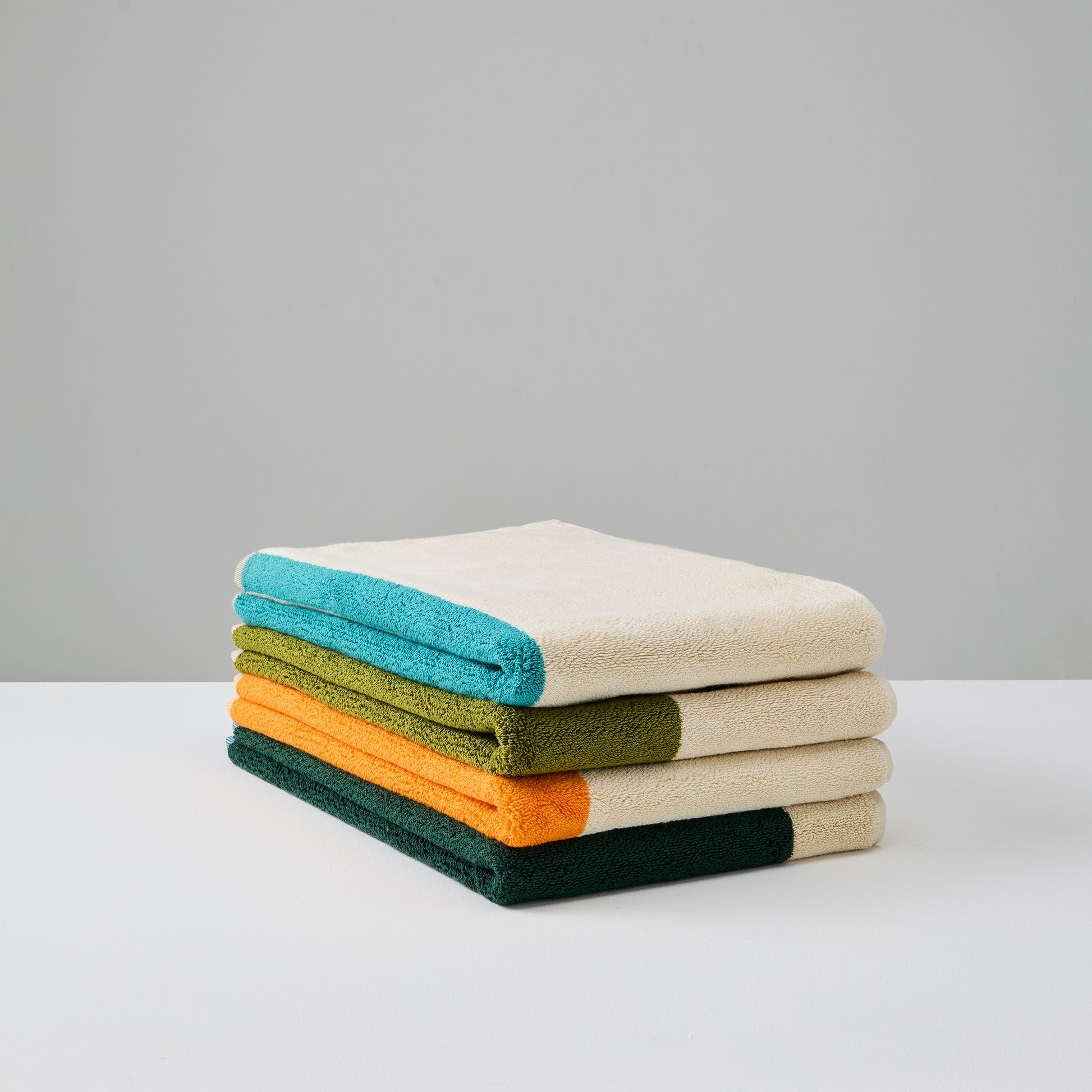 Badmat Martens & Martens Suite702│alle varianten dubbel gevouwen op stapel