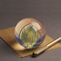 Teasel Paperweight Large│Presse-papier Kaardebol│Hafod Grange│op losse vellen papier naast pen