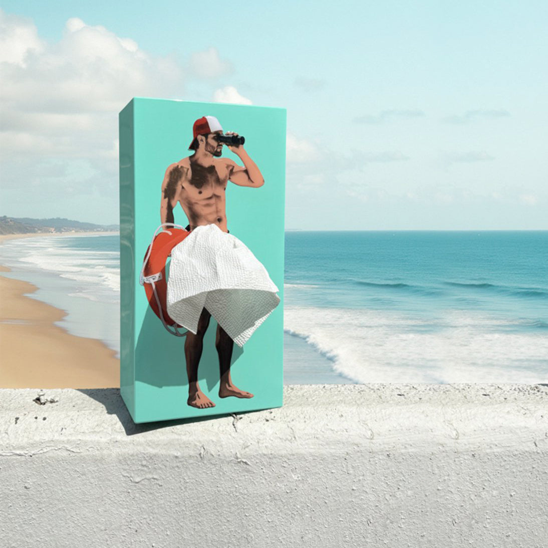 Tissue Up Boy Standwacht Blauw│Spextrum│art. TG006MAT│op balustrade aan strand