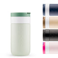 Dopper Travel Mug Small 300ml Forest Green - vooraanzicht met andere kleuren ernaast klein afgebeeld