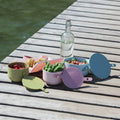 Uhm Bowl 01 en 02 in diverse kleuren op houten vlonder.