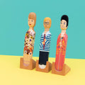 3 stuks Wedgie Standaard losstaand voor Deurstopper met diverse artiesten in houder en geel/groene achtergrond