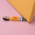 Wedgie Deurstopper Freeda (Frida Kahlo look) liggend onder gele deur