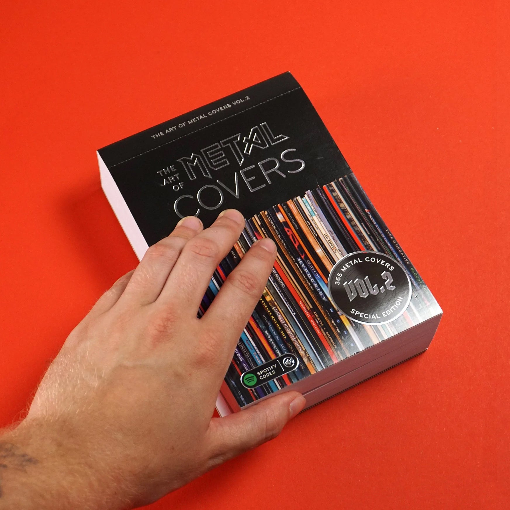 Scheurkalender The Art of Metal│Vinyl Platenhoezen│art. CA-METAL│met hand en rode achtergrond