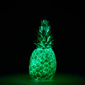 Piñacolada Lamp • Goodnight Light • Buitenverlichting • Designmarket.today • Haal tropische sferen in huis met deze coole Piñacolada lamp van het Spaanse merk Goodnight Light. Deze oplaadbare buitenlamp in de vorm van een ananas zorgt voor de perfecte sfeerverlichting tijdens een zomeravond in je tuin. Maar ook binnen is hij een ware eyecatcher. Uitgerust met een dimbare 7-kleurige LED-module.