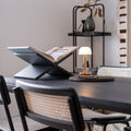 Humble Two Oplaadbare tafellamp Gold Frosted│Draadloos│art. HUMTL00204│op houten tafel naast opgengeslagen boek