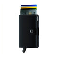 Secrid Miniwallet Matte Zwart│Pasjeshouder en Portemonnee│art. MM-BLACK│voorkant met uitgeschoven pasjes en clip