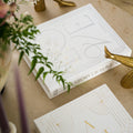 Fotoalbum Huwelijk Printworks│A Story of love│art. PW00606│op salontafel met bronzen beeldjes