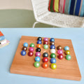 Bordspel Solitaire Remember│art. SOL1│op tafel met stoel op achtergrond