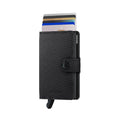 Secrid Miniwallet Carbon│Pasjeshouder│art. MCa-BLACK│voorkant met uitgeschoven pasjes en clip