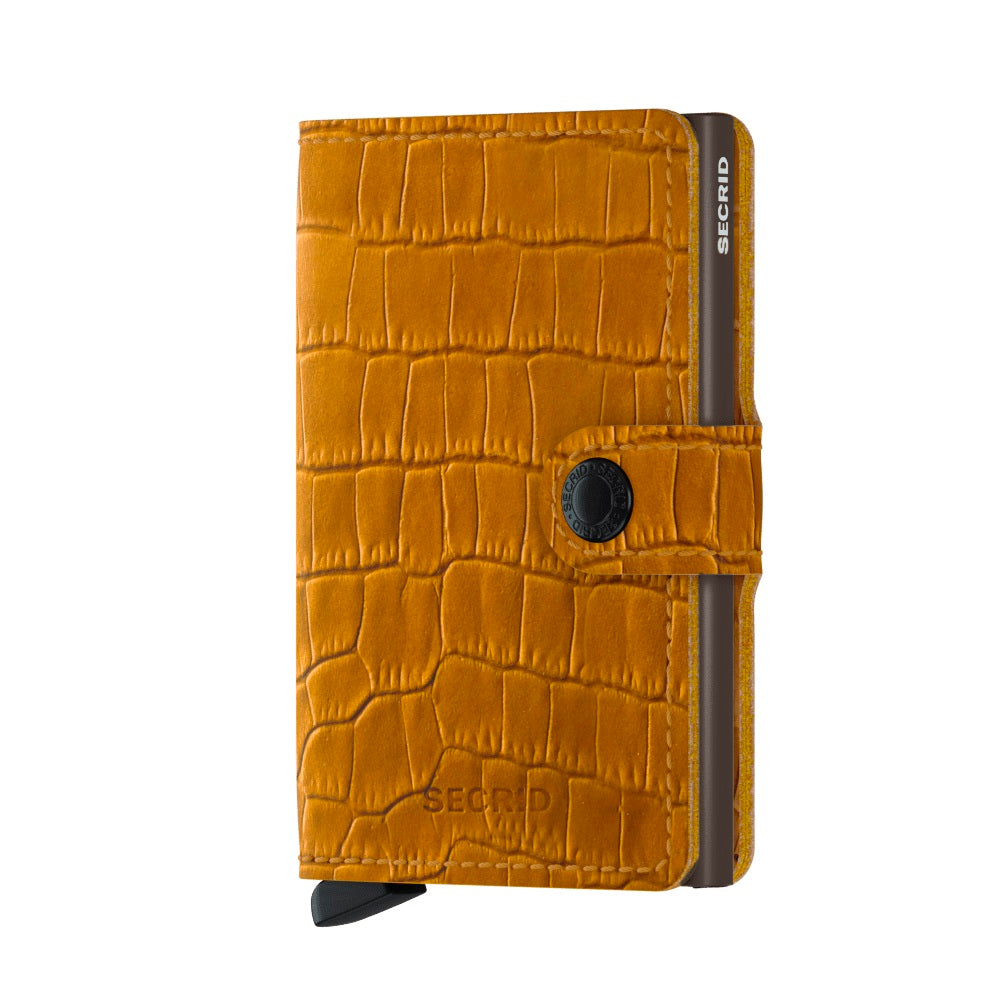 Secrid Miniwallet Cleo│art. MCL-OCHRE-BROWN│Pasjeshouder│voorkant met witte achtergrond