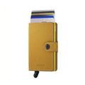 Secrid Miniwallet Crisple│Pasjeshouder│art. MC-OCHRE│voorkant met uitgeschoven pasjes en clip