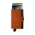 Secrid Twinwallet Perforated│art. TPF-COGNAC│Pasjeshouder│voorkant met uitgeschoven pasjes en clip