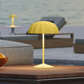 Sompex Ombrellino Oplaadbare Buitenlamp│Geel│art. 78353│op trrastafel aan zee
