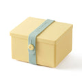 Uhmm 02 Opvouwbare Luchbox Citrus│art. 981277│vooraanzicht met strap Morning Mist