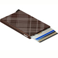 Secrid Cardprotector Laser│art. CLA-TARTAN BROWN│Pasjeshouder Aluminium│bovenaanzicht met uitgeschoven pasjes